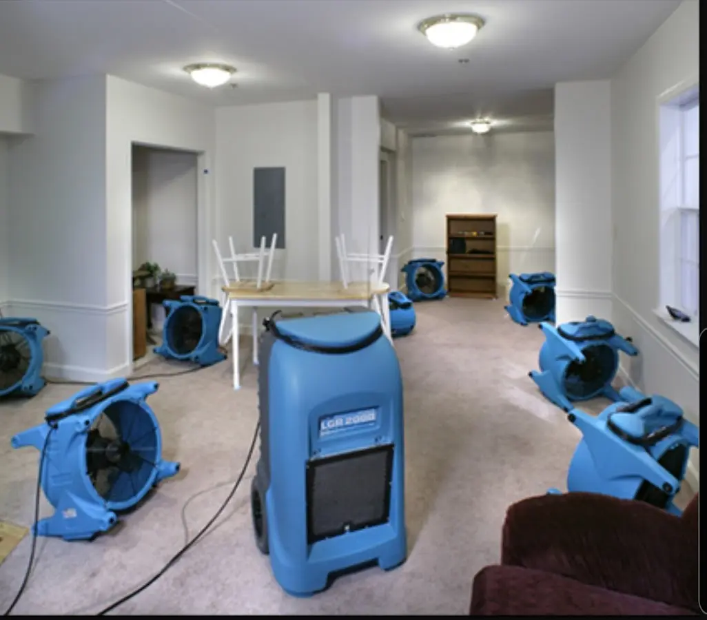 Air movers and dehumidifier setup for Water Damage Restoration in Woodway